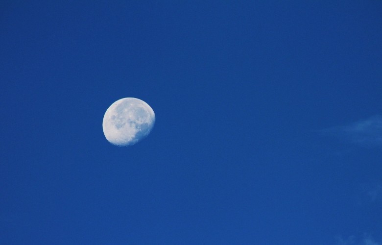 Waning Gibbous Moon on Blue Sky