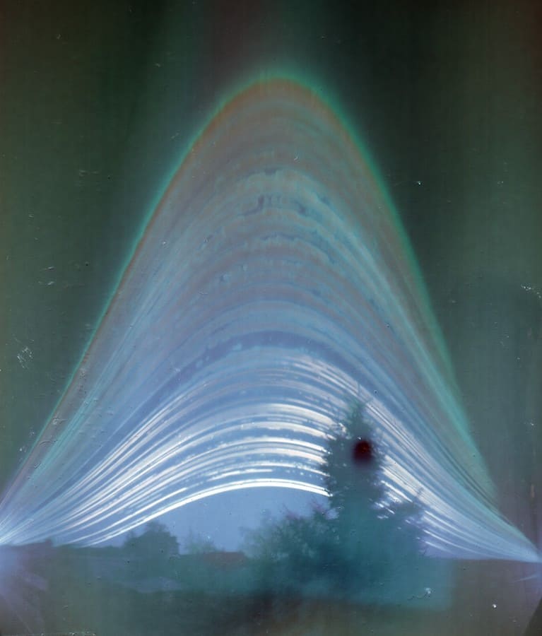 Solargraph showing the sun path in the sky throughout a year-long exposure using a pinhole camera